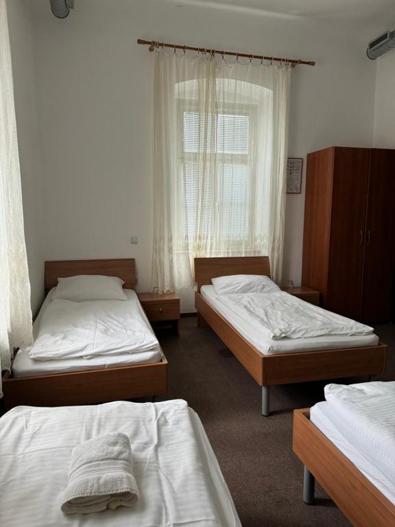 Postel nebo postele na pokoji v ubytování Guesthouse Pri Tonetu