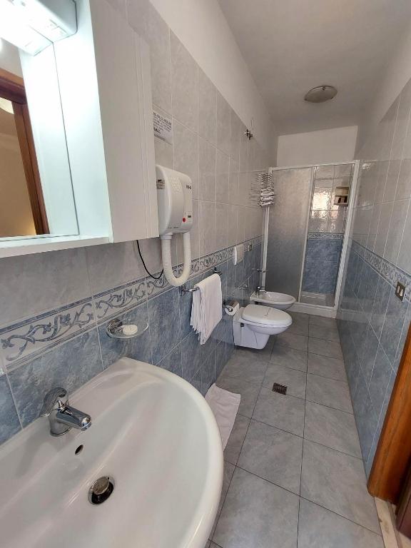 Koupelna v ubytování Hotel Nettuno