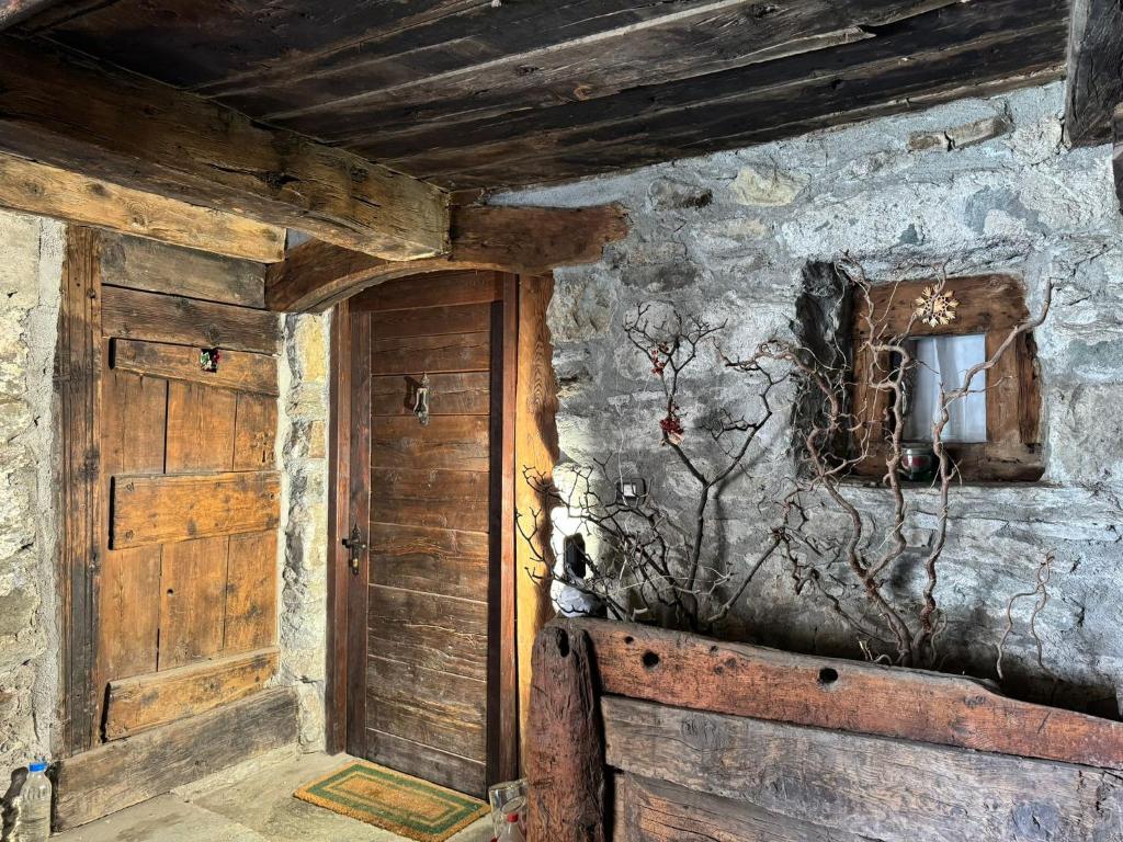 Billede fra billedgalleriet på Abri des Cimes, dormire tra pietra e legno CIR 0124 i Champoluc