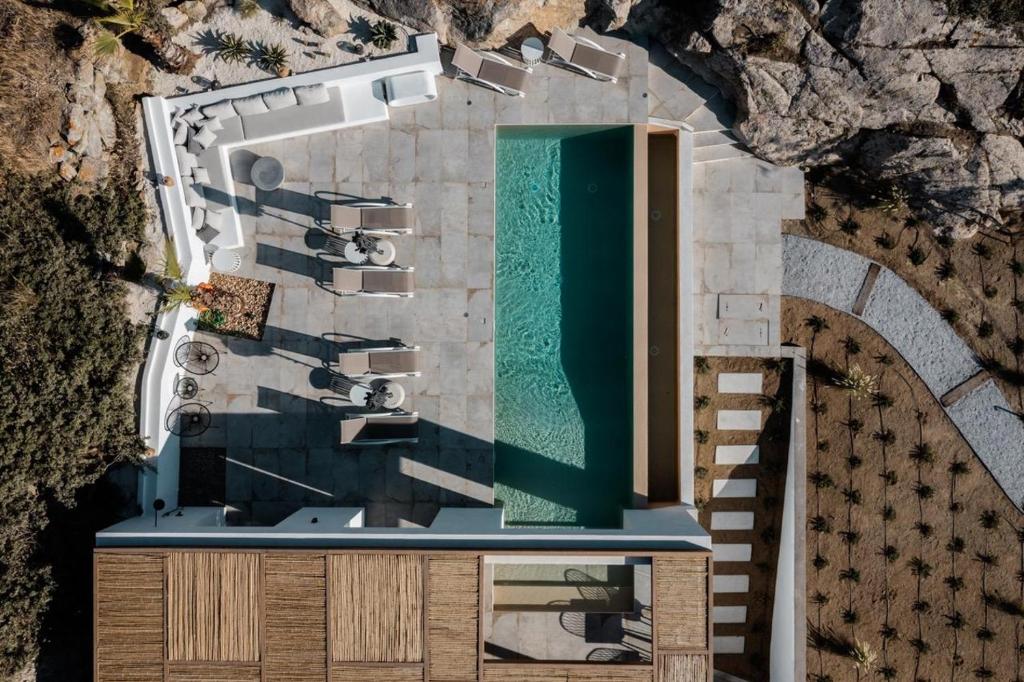 The swimming pool at or close to Mikri Sorriso - Luxurious Villa On The Beach