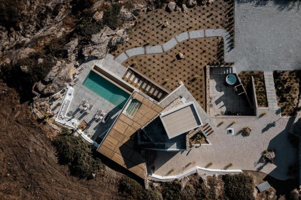 The swimming pool at or close to Mikri Sorriso - Luxurious Villa On The Beach