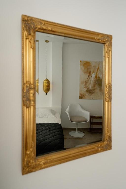 A bed or beds in a room at Mikri Sorriso - Luxurious Villa On The Beach