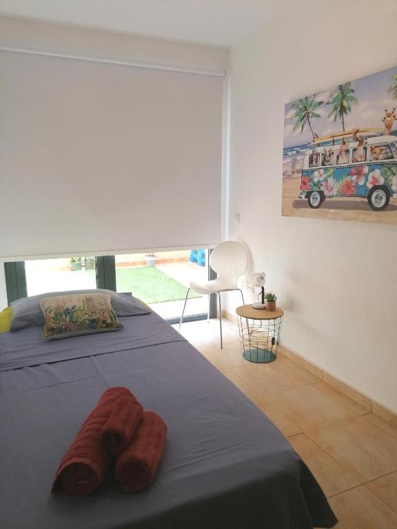 Postel nebo postele na pokoji v ubytování Casa en Cotillo Lagos with Wifi & Netflix