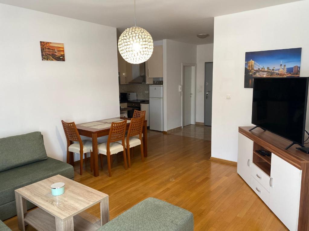 Μια τηλεόραση ή/και κέντρο ψυχαγωγίας στο Apartment Lux