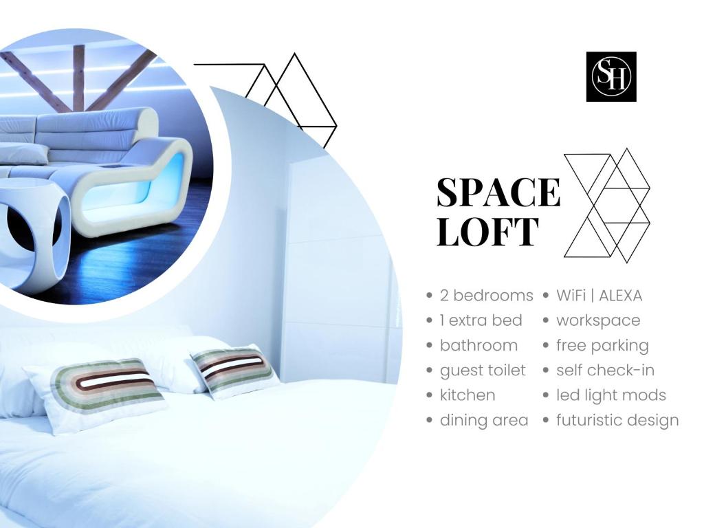SECRET HIDEAWAYS Space Loft Wohndesign auf 2 Etagen l 450m bis Uni في دويسبورغ: تقديم غرفة بسرير وكرسي
