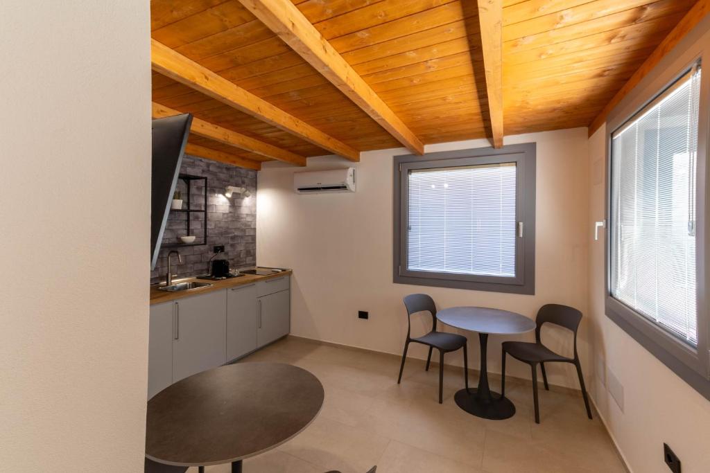 Eldhús eða eldhúskrókur á Sardinian Days - Suites & Rooms