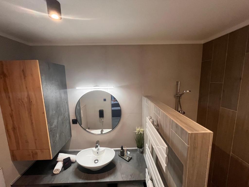 Koupelna v ubytování Várkapu Apartmanok 2