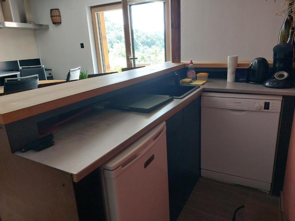 Kuchyň nebo kuchyňský kout v ubytování Winstub du vigneron