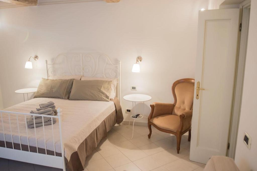 Postel nebo postele na pokoji v ubytování Casa Laurentius