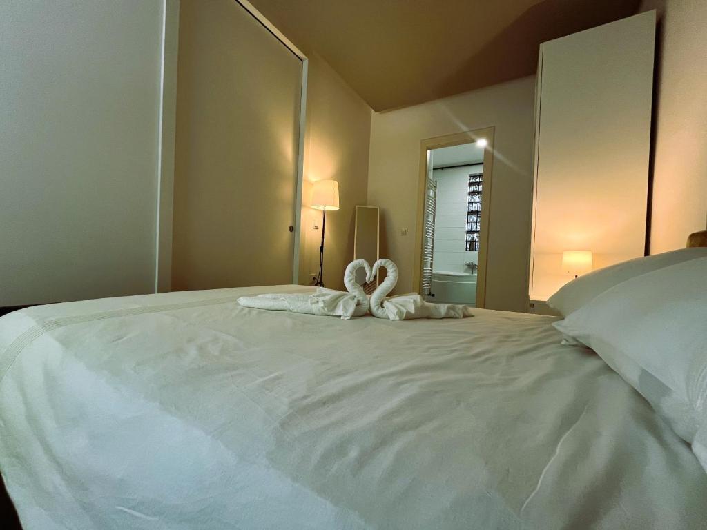 Postel nebo postele na pokoji v ubytování Knez Trpimir