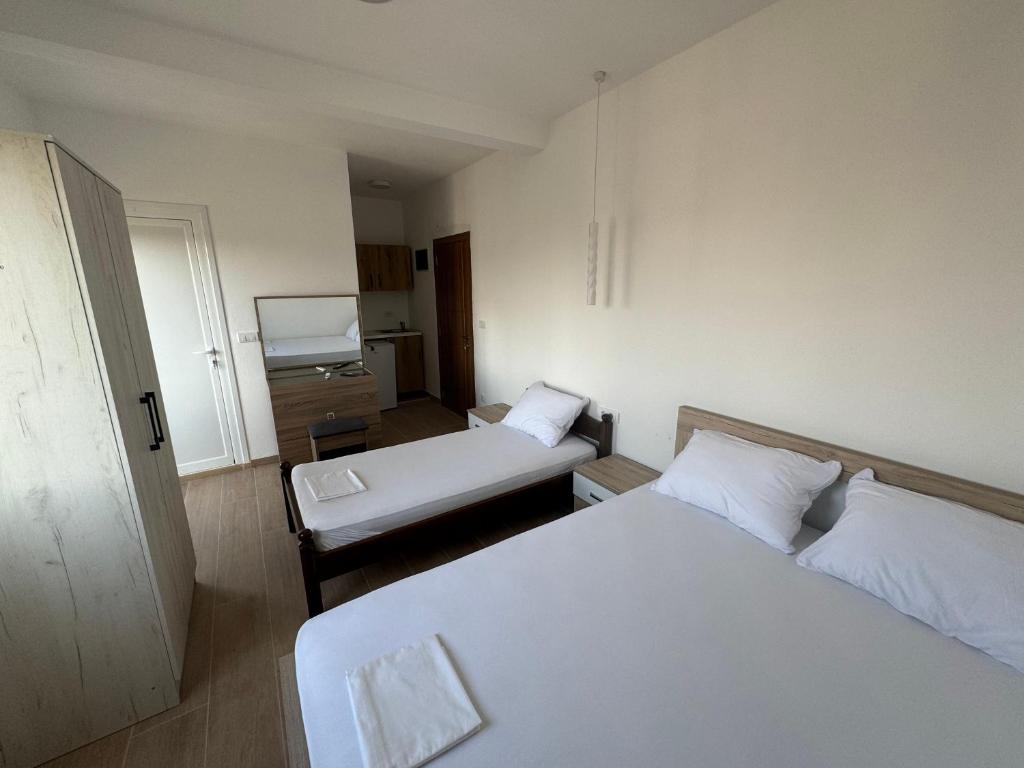Postel nebo postele na pokoji v ubytování Magda apartments