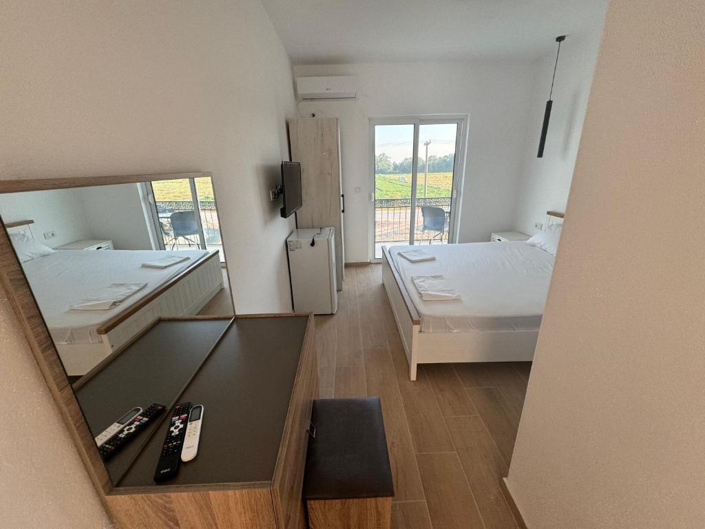 Postel nebo postele na pokoji v ubytování Magda apartments