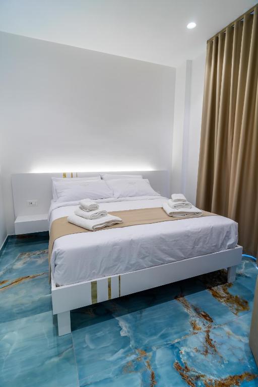 Letto o letti in una camera di Suite 14