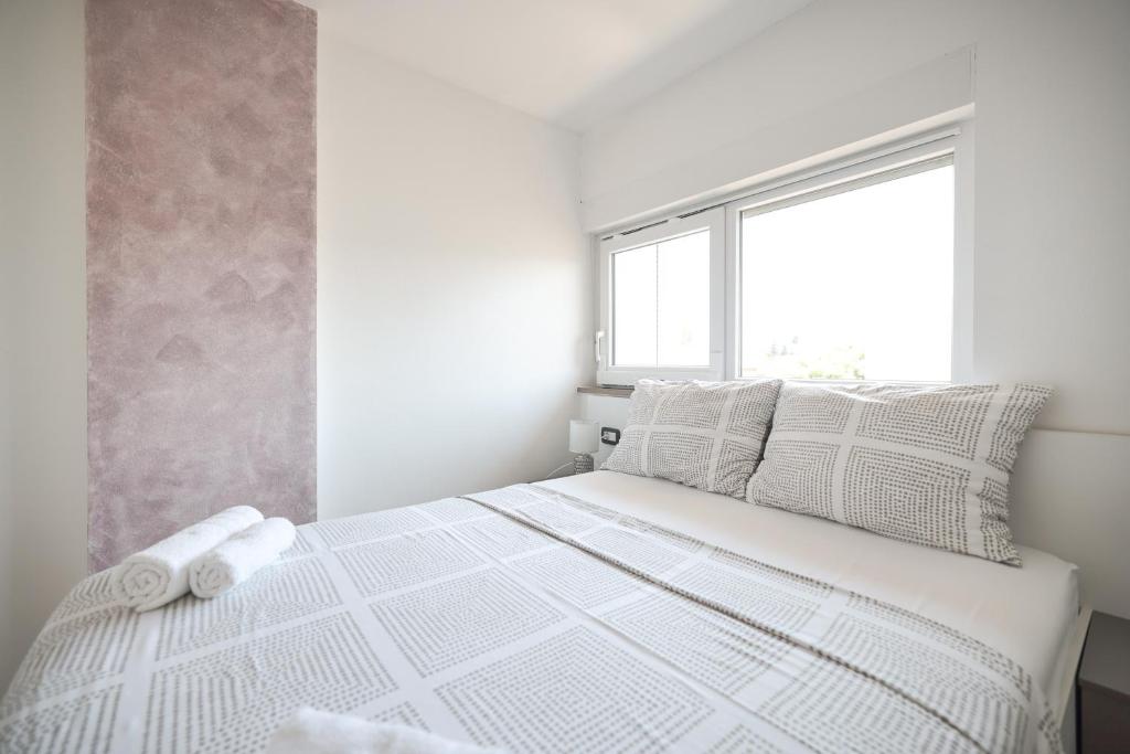Posteľ alebo postele v izbe v ubytovaní Apartment Anita