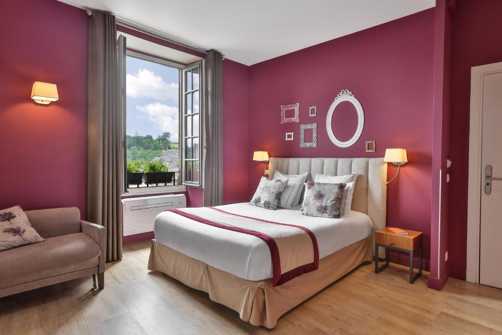 Postel nebo postele na pokoji v ubytování Hôtel Joyet de Maubec