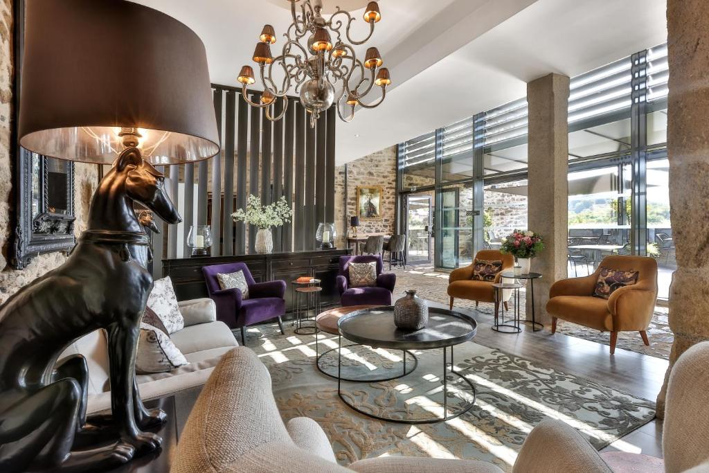 Posezení v ubytování Hôtel Joyet de Maubec