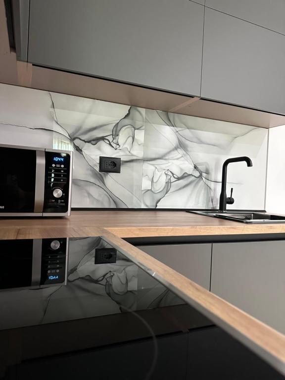 Köök või kööginurk majutusasutuses Gael Luxury Apartment