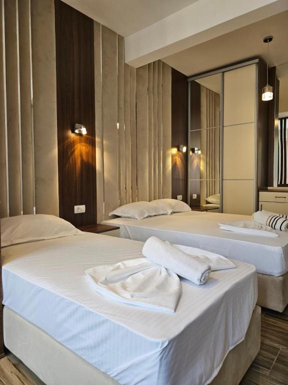 Postel nebo postele na pokoji v ubytování Begu Motel