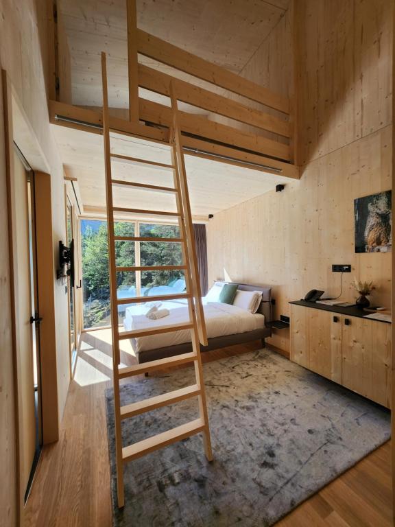Postel nebo postele na pokoji v ubytování Zoo des Marécottes Boutique Hôtel