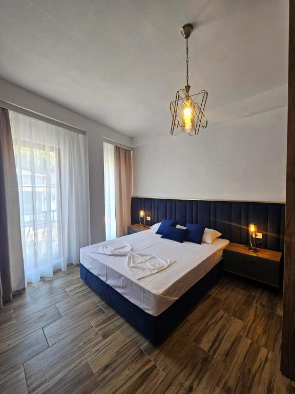 Postel nebo postele na pokoji v ubytování Begu Motel
