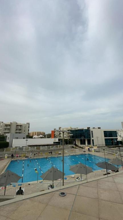 Bazén v ubytování Compound the address el sheikh Zayed nebo v jeho okolí