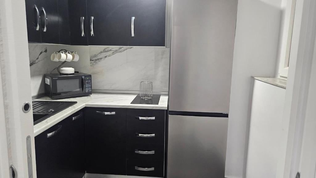 Kuchyň nebo kuchyňský kout v ubytování Rooms Vico Giunti