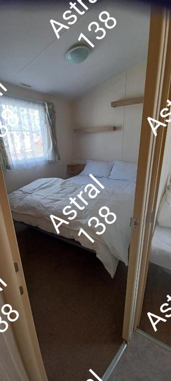 Postel nebo postele na pokoji v ubytování Astral 138