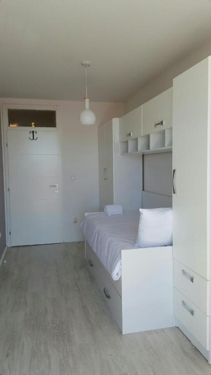 Postel nebo postele na pokoji v ubytování Single Room- Aparthotel GEA