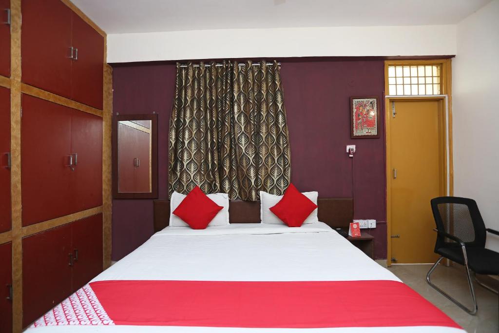 Postel nebo postele na pokoji v ubytování Vibrant Guest House