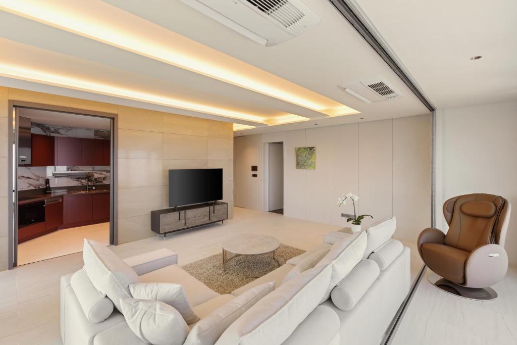 TV a/nebo společenská místnost v ubytování NewCZ Haeundae Residence