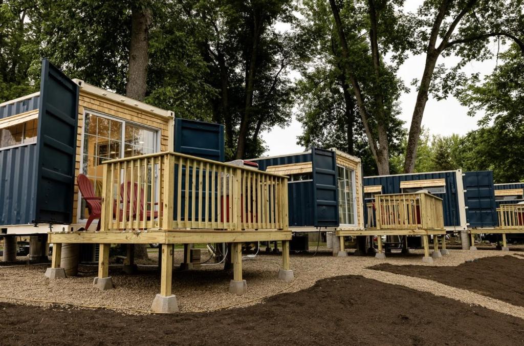 a row of wooden play houses in a park at Schuyler Yacht Basin in Schuylerville
