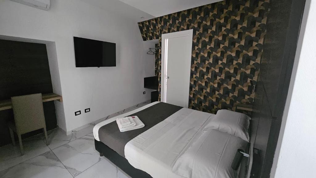 Postel nebo postele na pokoji v ubytování Rooms Vico Giunti