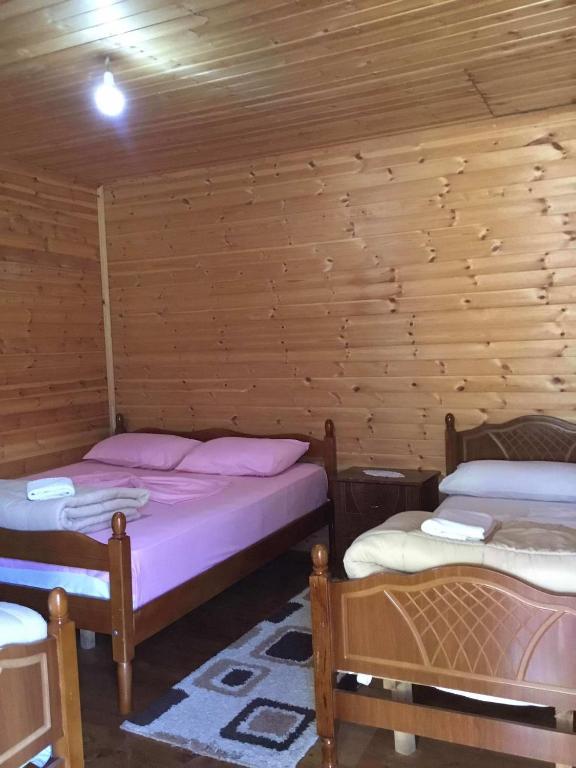 Postel nebo postele na pokoji v ubytování Zariklis