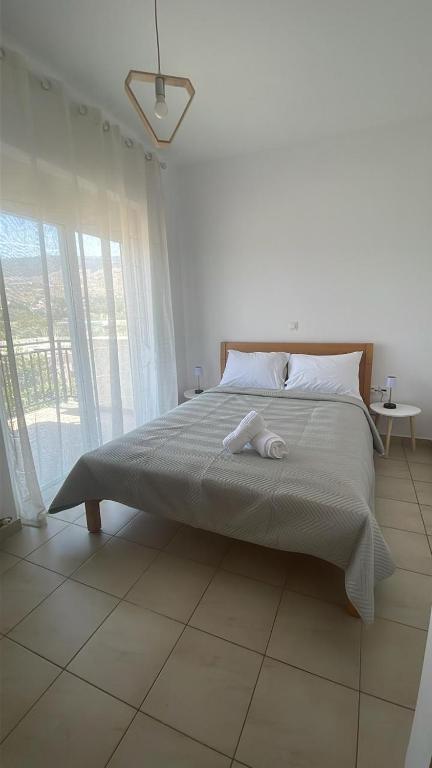 Postel nebo postele na pokoji v ubytování Yapyli Home