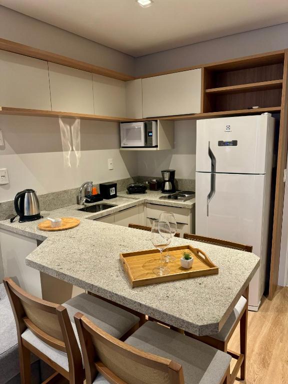 Kuchyň nebo kuchyňský kout v ubytování Sensacional Flat no Serra Class