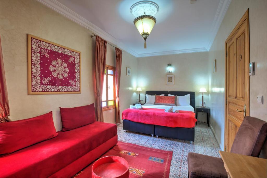 Postel nebo postele na pokoji v ubytování Riad Inaka