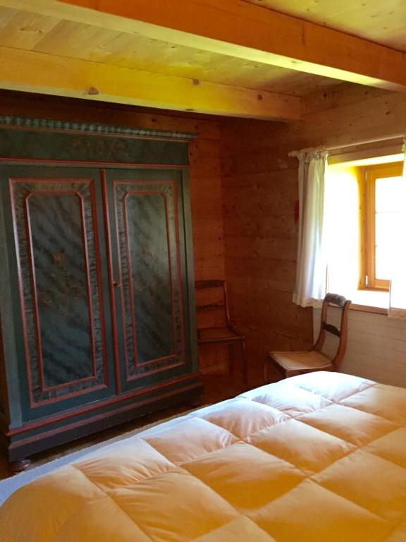 Postel nebo postele na pokoji v ubytování Chalet Charm