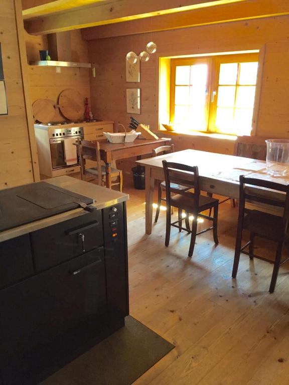Kuchyň nebo kuchyňský kout v ubytování Chalet Charm