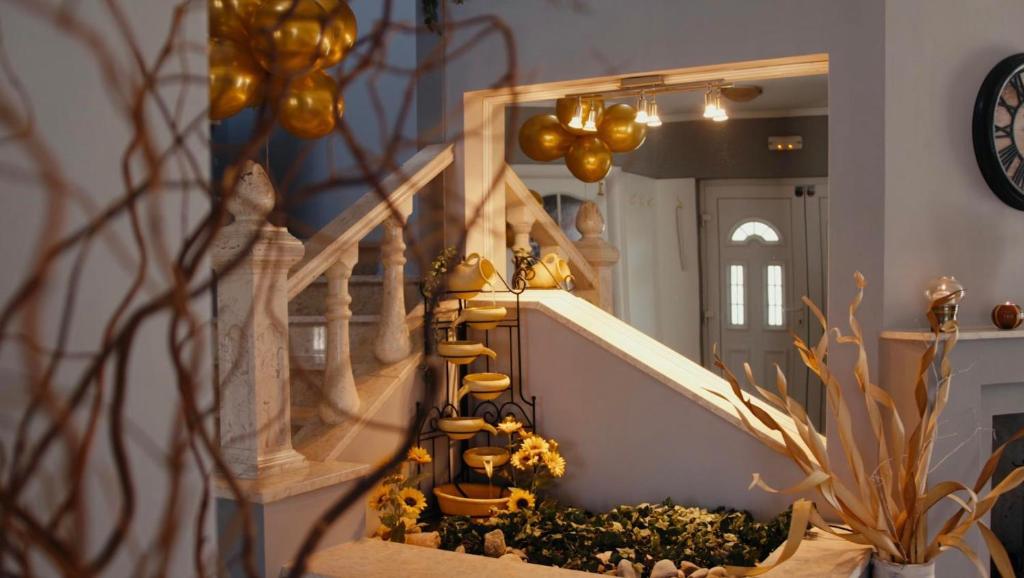 a staircase with a bunch of pumpkins on it at Villa Rita in Županja