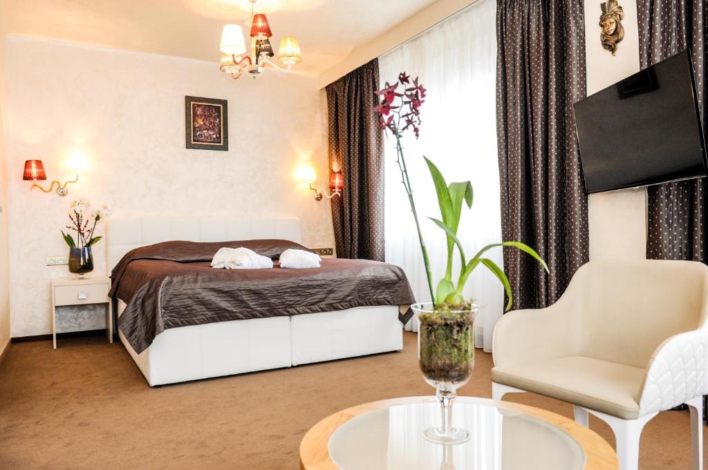 Postel nebo postele na pokoji v ubytování Myo Hotel Mysterius