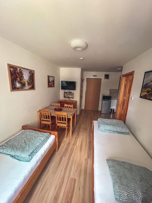 Postel nebo postele na pokoji v ubytování Groppenstein Apartmanház