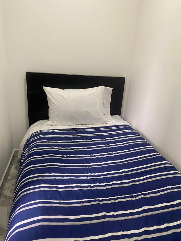 Postel nebo postele na pokoji v ubytování La posada de Martha