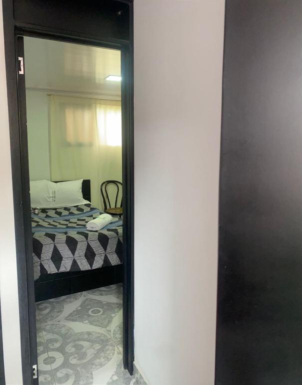 Postel nebo postele na pokoji v ubytování La posada de Martha