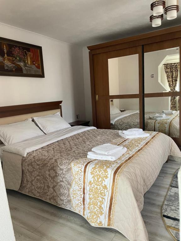 Postel nebo postele na pokoji v ubytování Casa Roșca