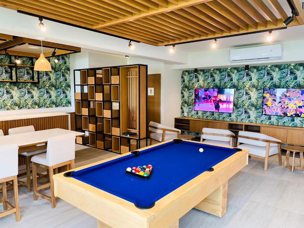 TV a/nebo společenská místnost v ubytování Wyndham Grand Cancun All Inclusive Resort & Villas