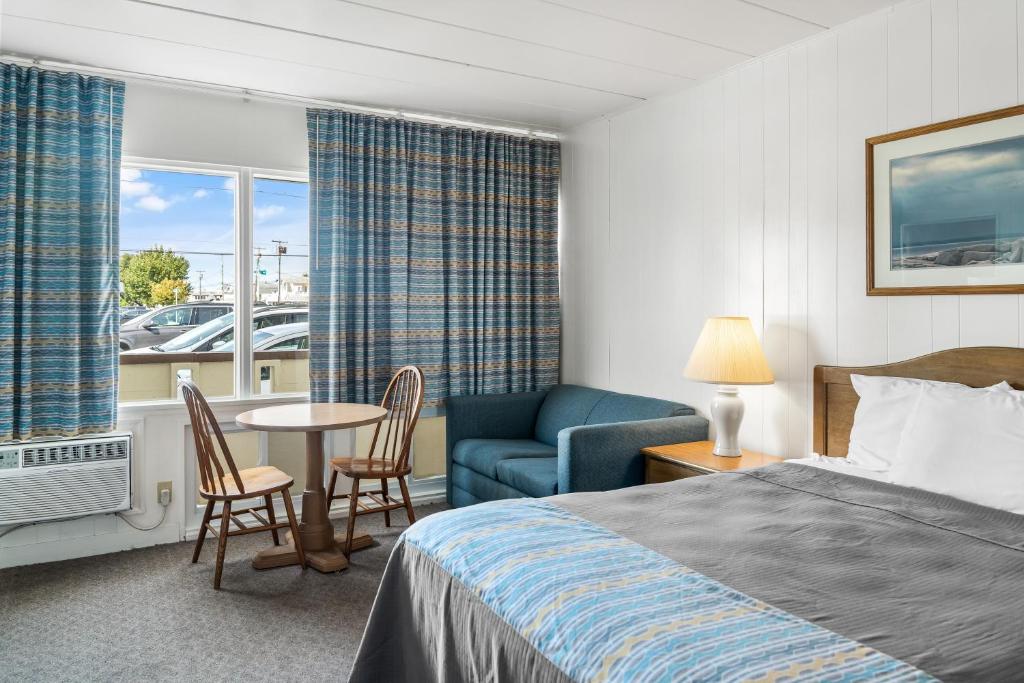 Postel nebo postele na pokoji v ubytování Lark Motel