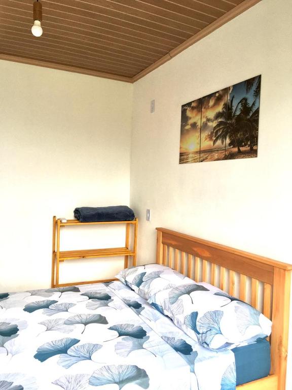 Postel nebo postele na pokoji v ubytování Mar Doce Lar Suítes Trindade