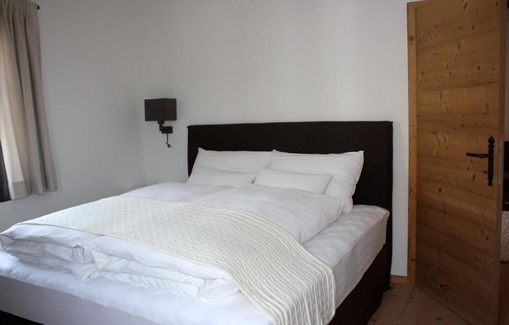 Postel nebo postele na pokoji v ubytování Hallerwirt Homes