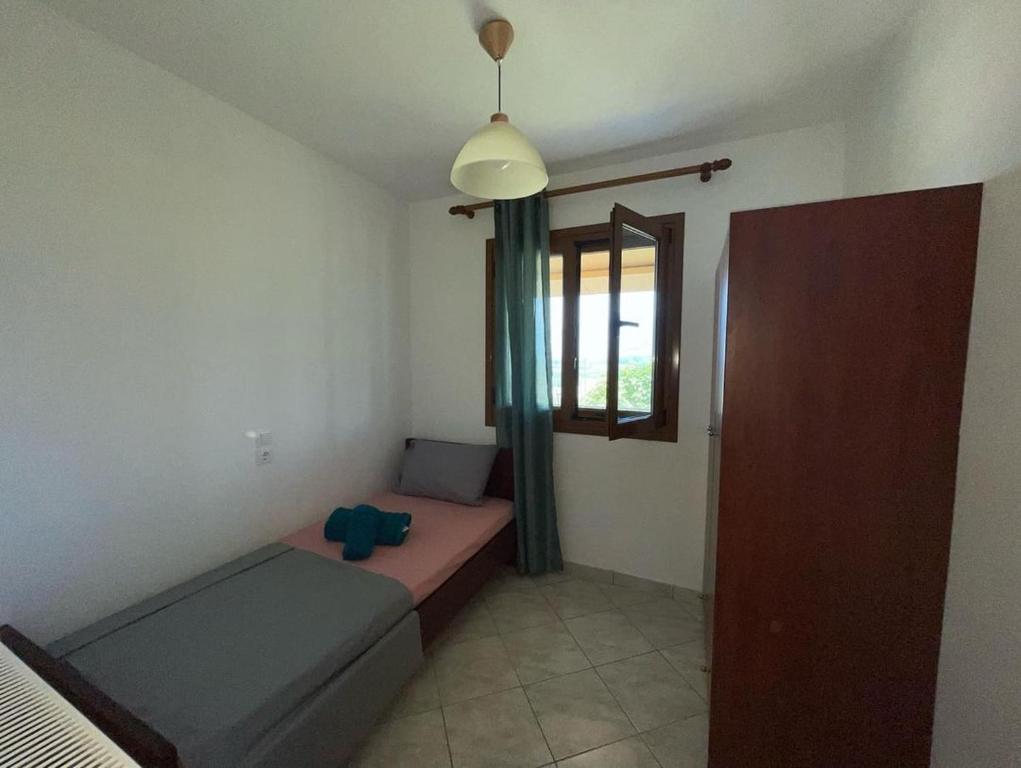 Postel nebo postele na pokoji v ubytování Maison Olga