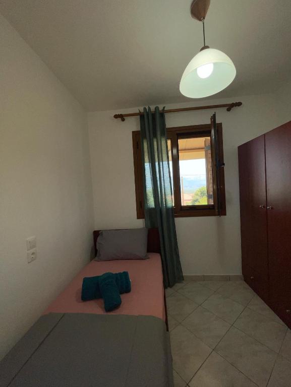 Postel nebo postele na pokoji v ubytování Maison Olga